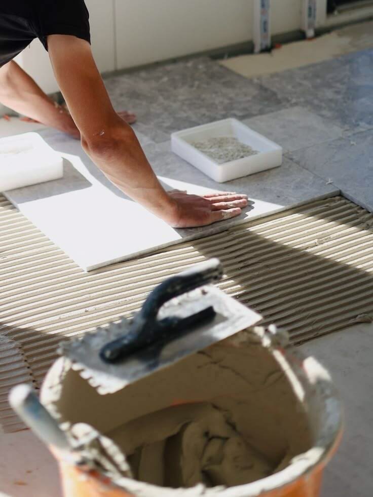 Tile installation during an interior remodeling job